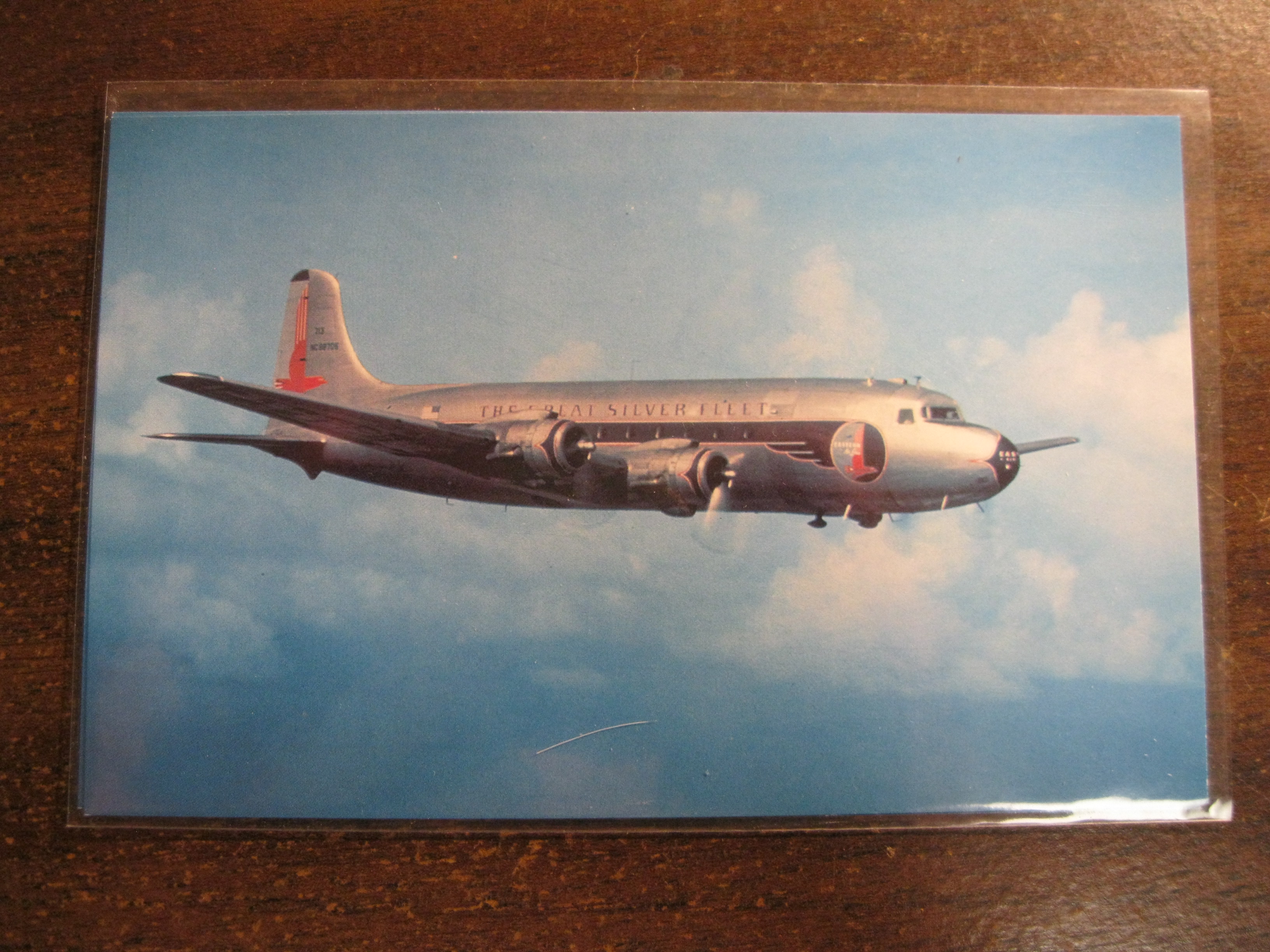 Eastern Airlines DC-4 Post Card over Miami