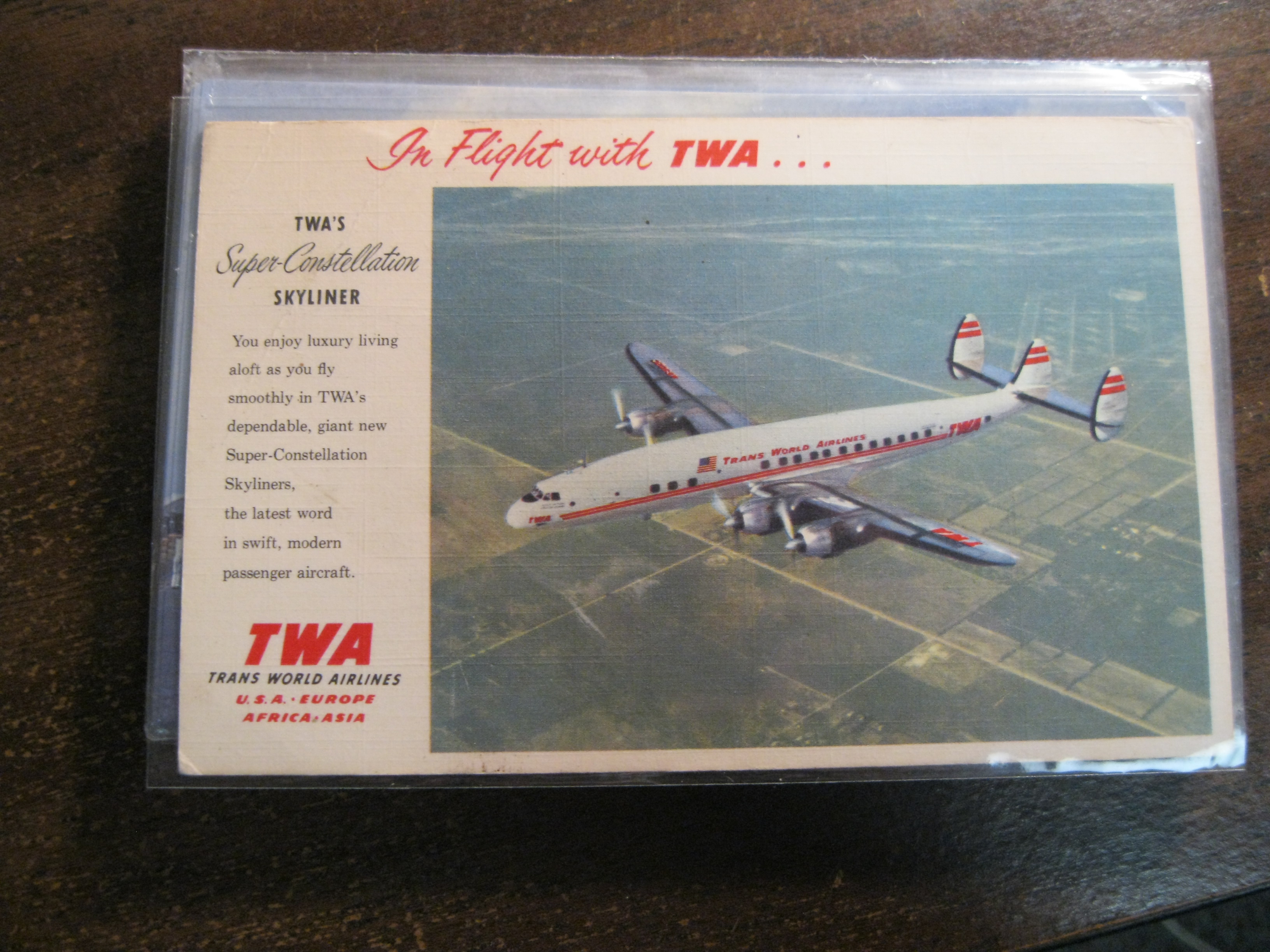 In flight with TWA Super Constellation Skyliner POst Card